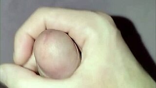 young guy masturbating his cock solo at home