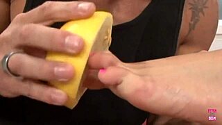 amazing brunette squishes melon with sexy feet, then gets fucked doggy style