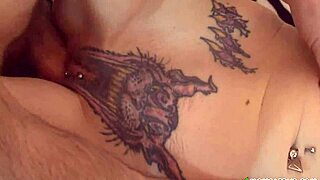 Tattooed blonde milf showcases her mature body in detailed scene