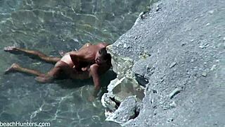 Watch this beach couple have sex again. Is it hotter this time?