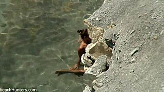 Watch this beach couple have sex again. Is it hotter this time?