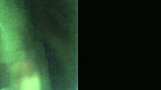 A stunning woman enjoys intimate moments with her partner in this outdoor location