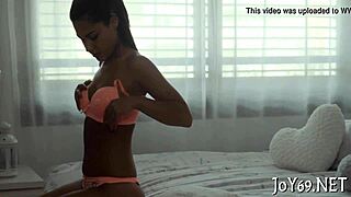 Stunning woman pleasures herself by rubbing her itchy pussy