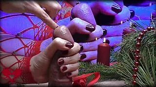Mrs. Santa Claus Gives Her Hubby A Handjob In Close-Up.
