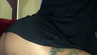 Ebony Babe In Thong Plays With Her Ass On Bed