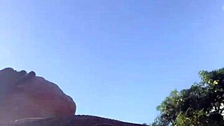 Crazy girl loves shaking her huge butt in the open air