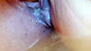 She's in the creamy bathtub, solo dildoing her wet pussy