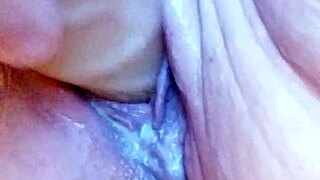 She's in the creamy bathtub, solo dildoing her wet pussy