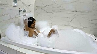 Enjoying Sensual Foam Bath in Bathtub
