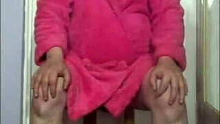 A shy bisexual man shares a homemade video of him masturbating with a glass of urine.