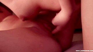 Brunette and blonde milfs kiss passionately