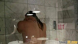 Smalltitted shemale with trimmed pussy showers in bathroom close up