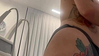 blonde tattooed woman teases in dress