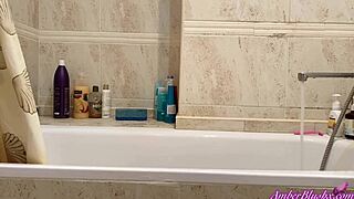 Blonde babe masturbates pussy and orgasms in bathroom solo