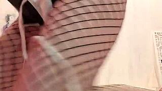 Passionate Beauty Indulges in Solo Play After Christmas Photoshoot for Intense Climax