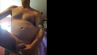 shy bisexual guy gets naked and shoots a huge cumshot at home