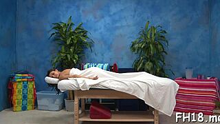 Katie Jordan, a beautiful brunette, is given a sensual massage with a happy ending