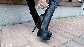 Russian blonde in tight leather teases with killer boots! 🔥