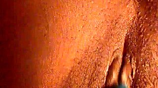 I'm playing with my pretty ebony pussy