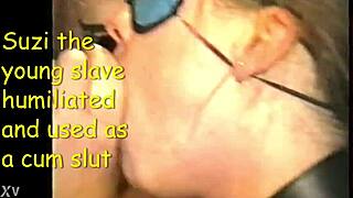 Suzi the young slave takes cum in her mouth