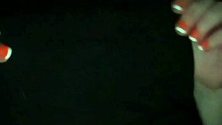 Beautiful woman with big boobs performs a striptease