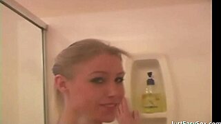 curvy babe pleasures herself in the shower