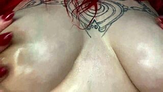 sexy bbw babe massaging her big natural tits with oil in lingerie