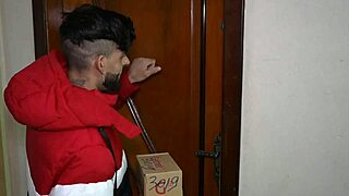 Young Brazilian interacts with muscular delivery guy.