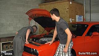 Gay mechanic sucks big cock in garage