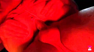 A group engages in licking and binding in a bdsm dungeon with heels and shoes.