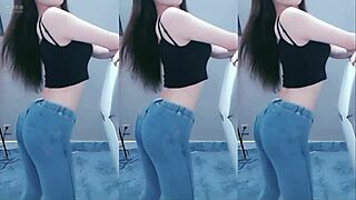 this chinese girl is dancing and shaking her ass so sexily