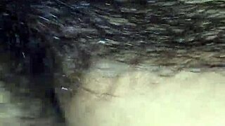 Under the rain, the gay couple engages in anal assfucking sex