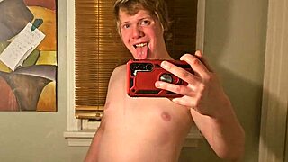 this gay guy jerks off in a solo session, watching some hot porn clips