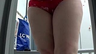 Public pool locker room hidden cam captures mature MILF