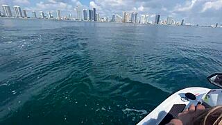 Beautiful blonde gets a rough ride on a jetski in the water