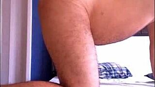 Muscular guy gives a hard spanking to his gay partner