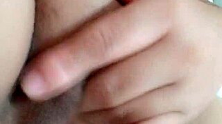 orgasm builds as i finger my wet pussy in bedroom