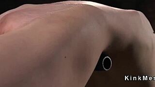 redhead slave's back arching in torment 😈