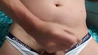 This gay boy is masturbating in his underwear, feeling so excited about it.