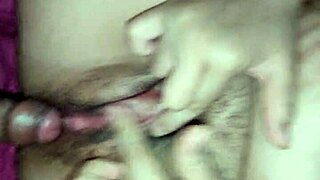 Vietnamese girl cries out in pleasure during intense session.