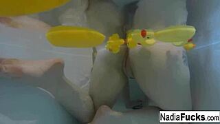 Sexy nadia takes a bath with some rubber duckies