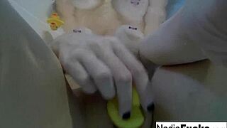 Sexy nadia takes a bath with some rubber duckies