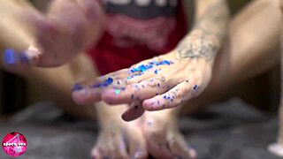 Babe Delivers Sensual Footjob on Rubber Cock