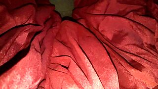 Bisexual shemale's sensual masturbation in red satin tease
