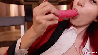 Redhead hottie Toffina pleasures her shaved pussy with a toy