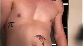 twink jerks off his big cock in the sunlight, feeling every inch