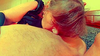 Steamy blowjob from a mature goth woman to a big cock