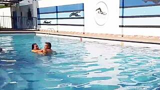 Fat housewife gets naughty in public pool with stranger