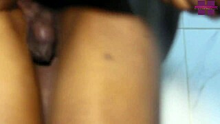 Happy ebony babe receives intense blowjob and ass fucking from shy black boy in homemade bathroom scene