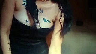 Goth woman with huge pussy lips shows off and masturbates her big pussy.